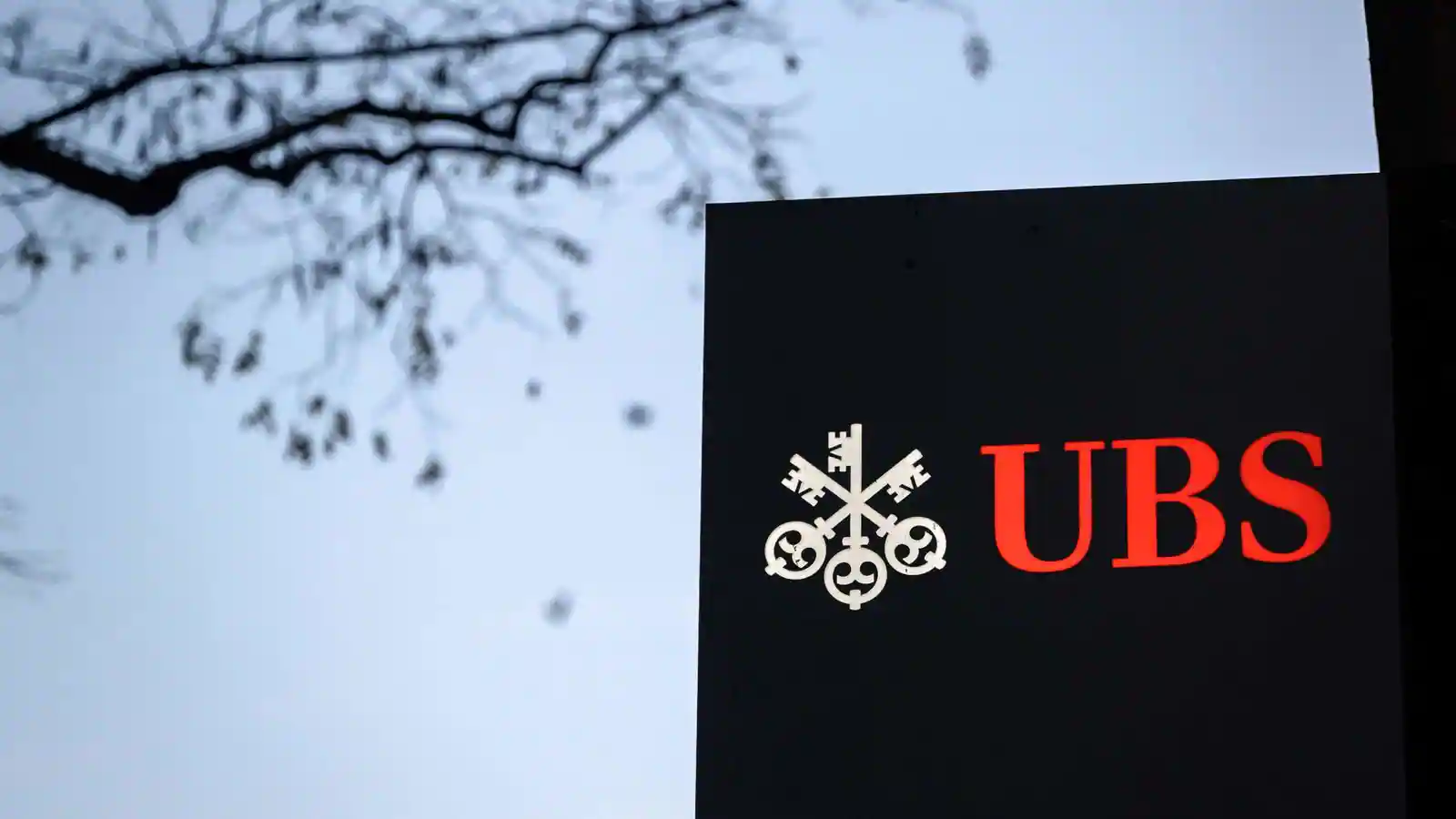 Sets aggressive new targets because of UBS posts slip in quarterly advantage to $1.35 billion